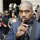 Kanye West (front) leaves a hotel in Paris on May 23, 2014, along with Kim Kardashian (center) and her mother, Kris Jenner (second from left).
KENZO TRIBOUILLARD/AFP/Getty Images